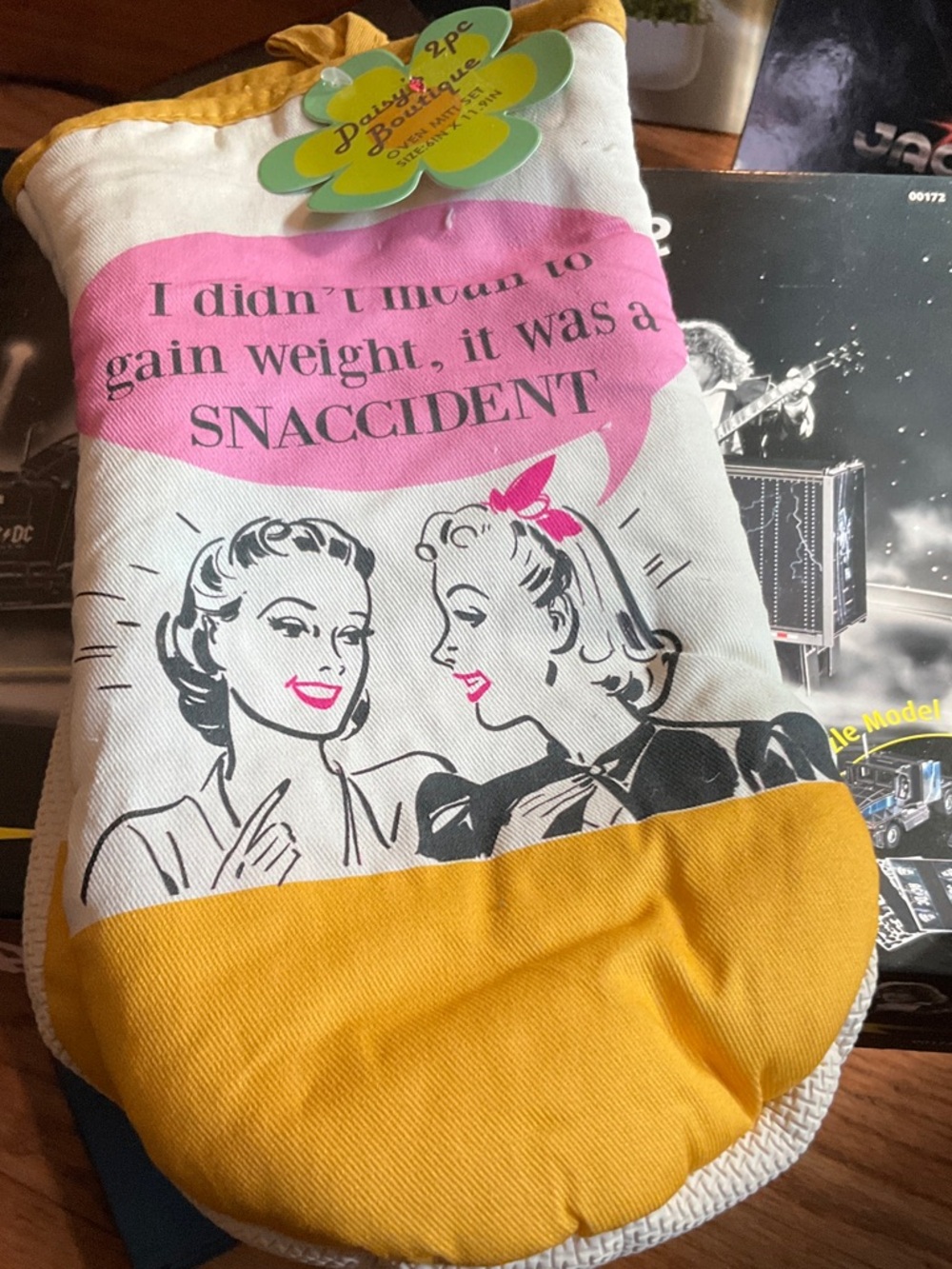 "Snaccident" oven mitt set from the Daisy Boutique Brand Pink and Yellow - Picture 3 of 7